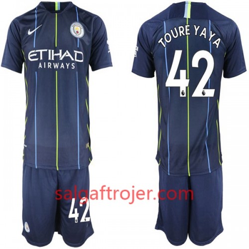 Manchester City Fodboldtrøjer Toure Yaya 42 Børn Udebanesæt 2018/19 Kort ærmer Manchester City Fodboldtrøjer Toure Yaya 42 Børn Udebanesæt 2018/19 Kort ærmer